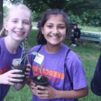 Students leaving with plants from the Sustainable Agricultural Project